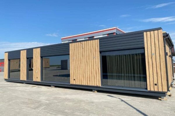 The Full Basics 8 Ft W X 30 Ft L X 9.5 Ft T 240 Sq.Ft. Weight Approx. 10,000 Lb 50 Amp Panel / 220W Plug In Included Modern Fiberglass Front Door Luxury Vinyl Plank Floors Dual Pane Tempered Glass Vinyl Frame Windows And Sliding Door Shiplap Paneling On Ceiling Aluminum Frame Glass Roll Up Garage Door 2”X3” Lumber Framing And Drywall Closed Cell Spray Foam Insulated (3” Walls And Ceiling) Shaker Style Wood Cabinets In Kitchen, Bath, And 2 Bedrooms Smoke Detector And Fire Extinguisher Tankless Propane Water Heater Pioneer Mini Split 9,000 BTU Solar Power / Tech (3) 320W Mono Solar Panels, 3000W Go Power Inverter (4) 500W Full River Solar Batteries, Mounting Rails, Propane 4 Burner Stove Electric Range Exhaust System Summit 7 Cu.Ft. Refrigerator Bathroom Ceramic Subway Tile Shower Moen Faucet And Shower Head Shaker Wood Vanity With Acacia Wood Counter Top, Farmhouse Sit On Top Sink Swiss Madison Dual Flush Toilet (Nature’s Head Composting Toilet - Image 2