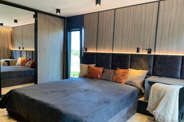 The Full Basics 8 Ft W X 30 Ft L X 9.5 Ft T 240 Sq.Ft. Weight Approx. 10,000 Lb 50 Amp Panel / 220W Plug In Included Modern Fiberglass Front Door Luxury Vinyl Plank Floors Dual Pane Tempered Glass Vinyl Frame Windows And Sliding Door Shiplap Paneling On Ceiling Aluminum Frame Glass Roll Up Garage Door 2”X3” Lumber Framing And Drywall Closed Cell Spray Foam Insulated (3” Walls And Ceiling) Shaker Style Wood Cabinets In Kitchen, Bath, And 2 Bedrooms Smoke Detector And Fire Extinguisher Tankless Propane Water Heater Pioneer Mini Split 9,000 BTU Solar Power / Tech (3) 320W Mono Solar Panels, 3000W Go Power Inverter (4) 500W Full River Solar Batteries, Mounting Rails, Propane 4 Burner Stove Electric Range Exhaust System Summit 7 Cu.Ft. Refrigerator Bathroom Ceramic Subway Tile Shower Moen Faucet And Shower Head Shaker Wood Vanity With Acacia Wood Counter Top, Farmhouse Sit On Top Sink Swiss Madison Dual Flush Toilet (Nature’s Head Composting Toilet - Image 5